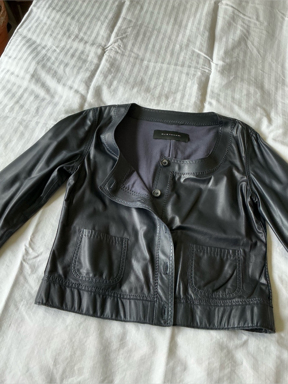 Elie Tahari Black Leather Button Front Jacket
Soft Italian kid leather.